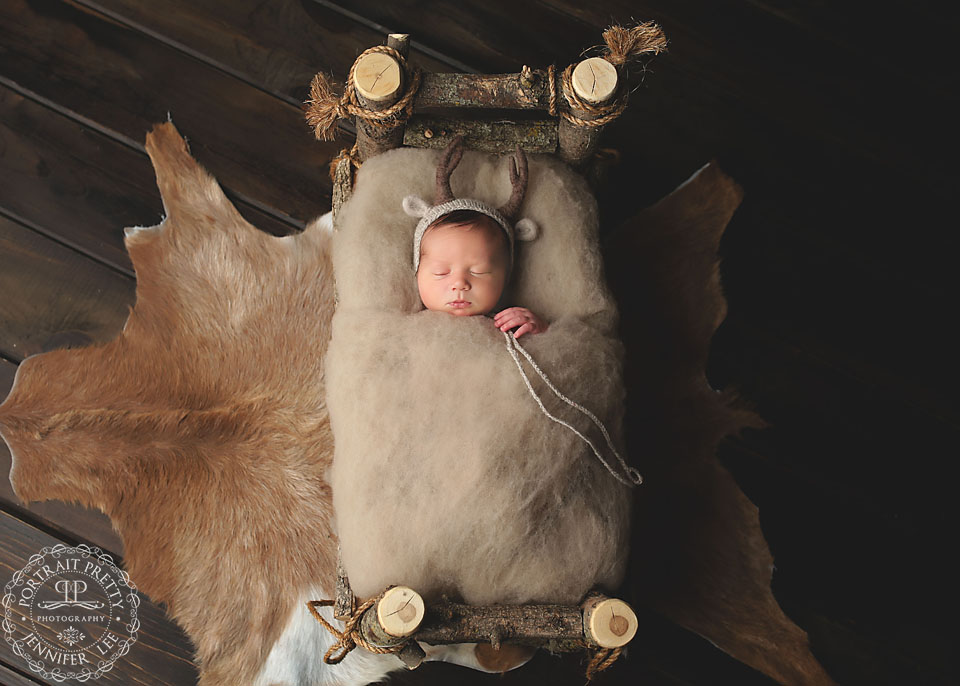 rustic log bed prop buffalo newborn photographer