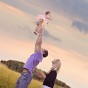 Knox farm family portraits grassy field sunset