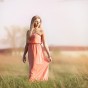 senior portrait sunset grassy field by portrait pretty photography