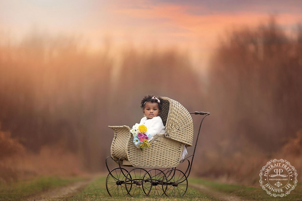 outdoor sunset baby portrait in pram baby carriage by portrait pretty photography buffalo ny