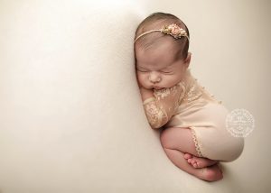 Buffalo NY Baby Photographer photographs newborn in Mia Joy outfit