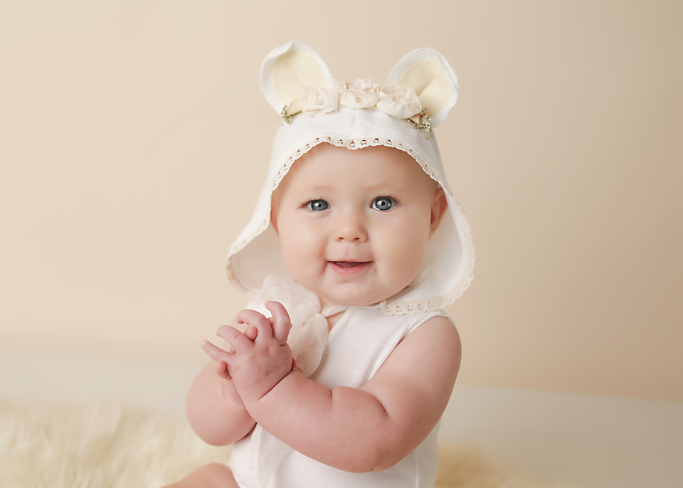 baby in bear romper portrait pretty photography